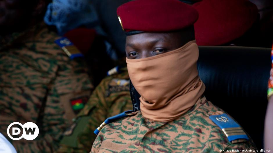 Mali's military ruler, Assimi Goita, center, attends an independence day military parade in Bamako, Mali