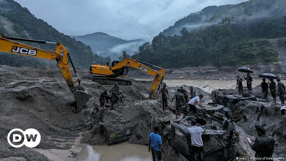 An Iranian women holds up her arm at a 2022 protest