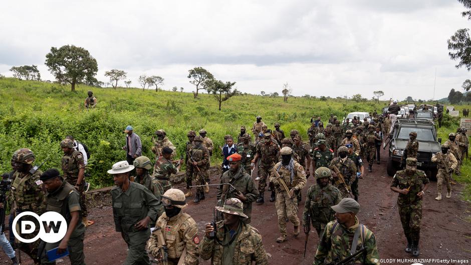 Soldiers work on a road construction site during a joint military operation of Uganda and the Democratic Republic of the Congo (DRC) against rebels of the Allied Democratic Forces (ADF) in Beni territory