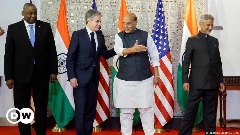 People walk through the lanes of a crowded market in New Delhi, India