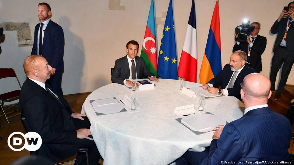 Armenia's Prime Minister Pashinyan Aliyev, left, with Azerbaijan's President Ilham Aliyev, right, and  President of the European Council Charles Michel, middle.