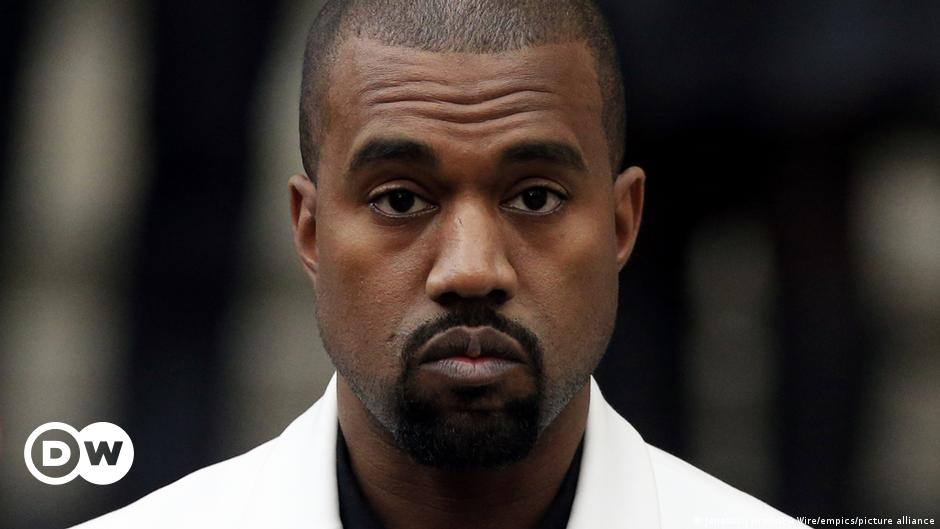 Rapper Kanye West wears a Make America Great again hat during a meeting with President Donald Trump in the Oval Office