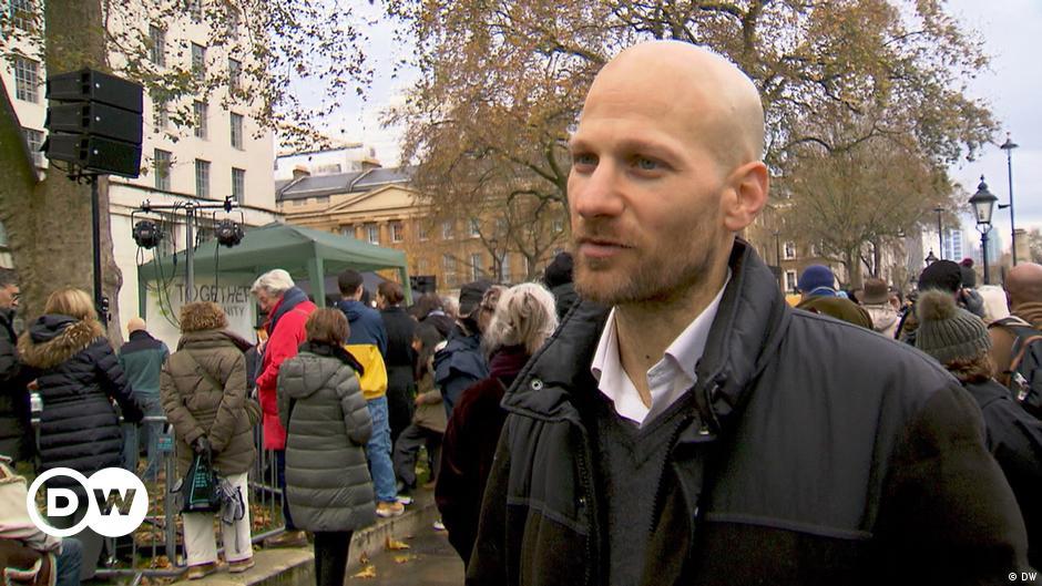 Palestinians fleeing Khan Younis huddle on the bed of a truck.