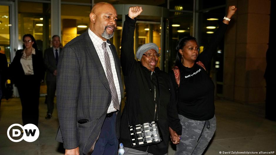A person holds a "Black Lives Matter" sign in front of the US District Court in St Paul, Minnesota, on February 24, 2022.