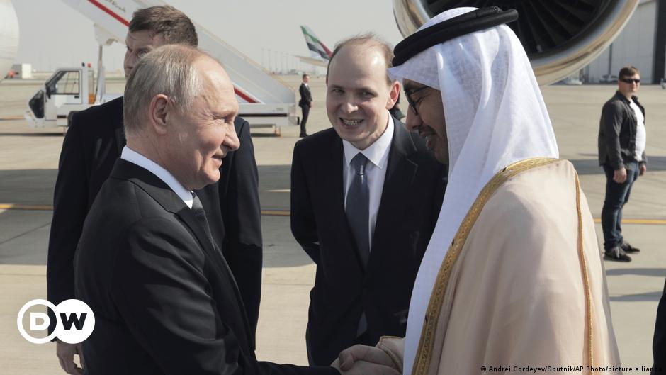 A man talks on the phone during the United Nations Climate Change Conference (COP28) in Dubai