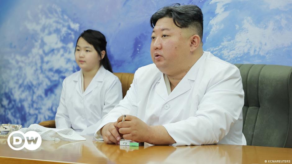 Kim Jong Un walks with his daughter Kim Ju Ae and his wife Ri Sol Ju
