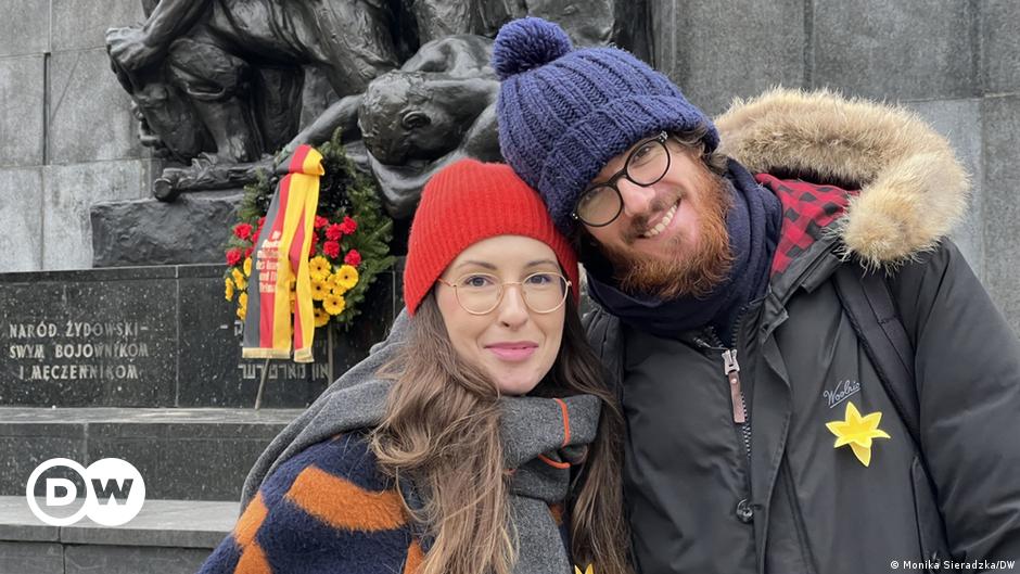 Headshot of a woman (Monika Sieradzka) with short blond hair and blue eyes