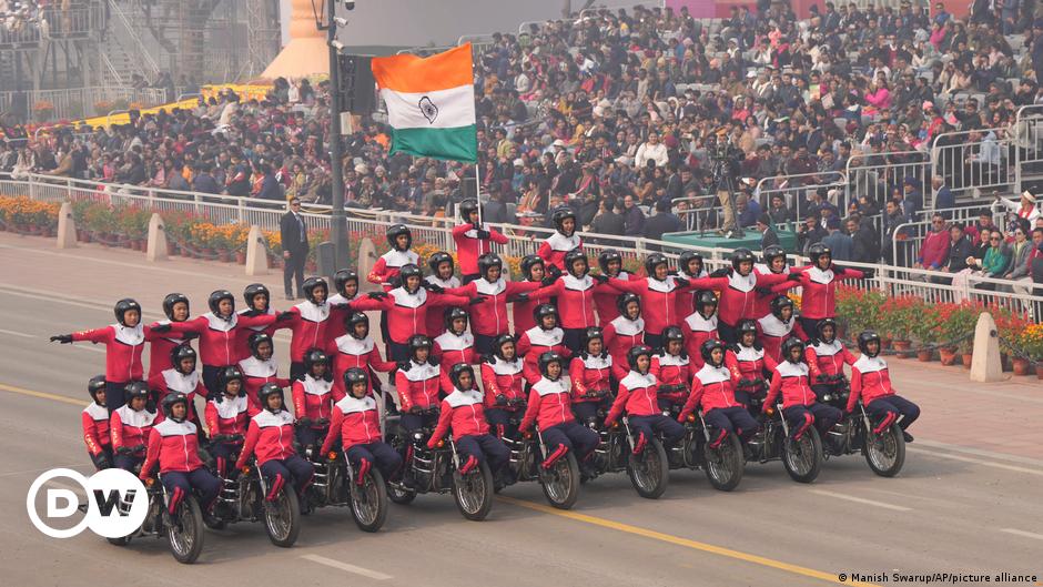 India's Prime Minister Narendra Modi waves as he arrives at the Paris-Orly Airport
