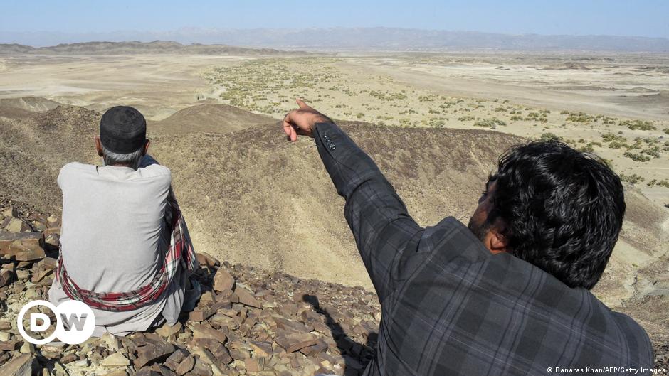 A police officer stands guard at the main entry gate of Pakistan's Ministry of Foreign Affairs, in Islamabad, Pakistan