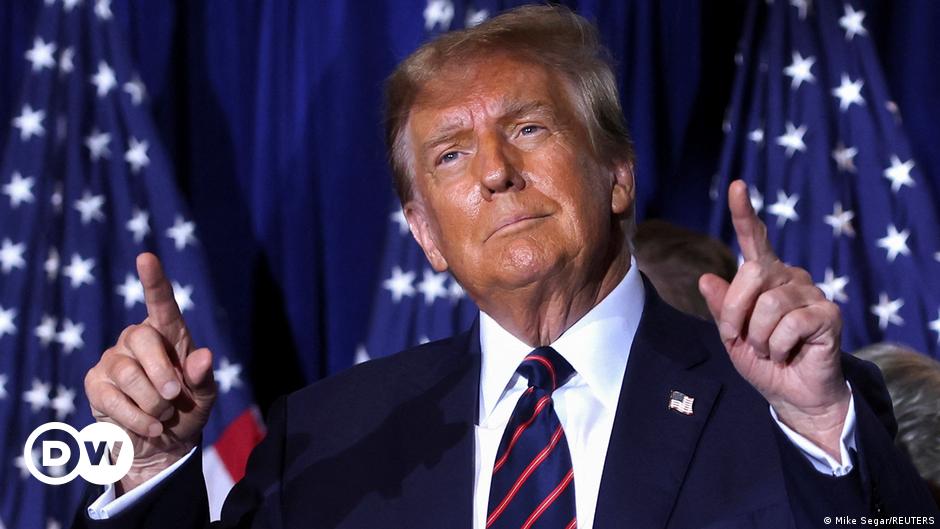 A woman has her face painted as the EU flag during a festival outside the European Parliament in Brussels, Sunday, May 26, 2019