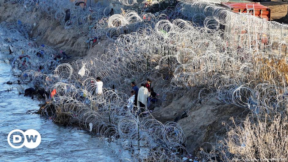Portrait of a man with blue eyes in a shirt and jacket, Majdan Square in the Ukrainian capital Kiev can be seen in the background