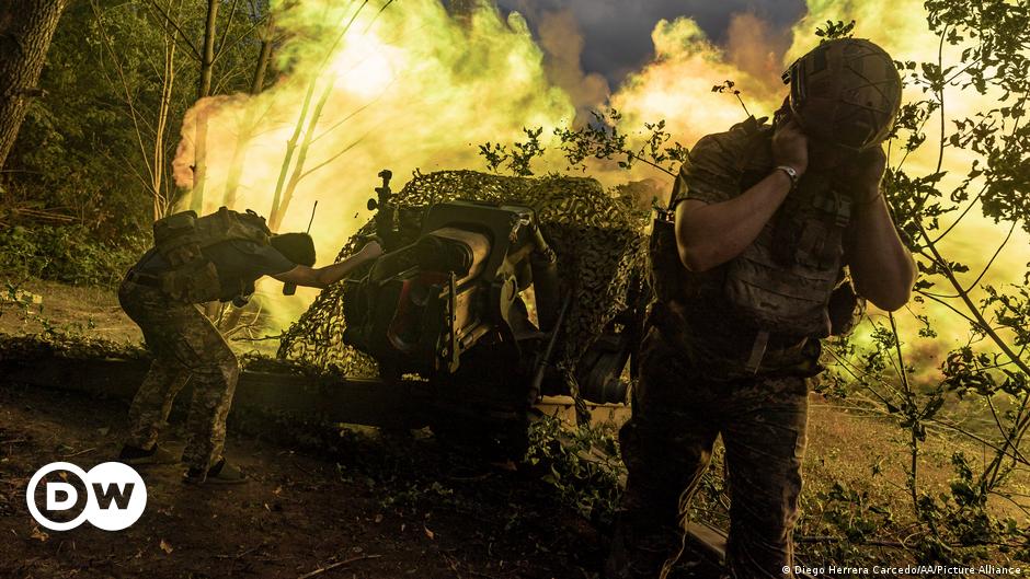 Portrait of a man with blue eyes in a shirt and jacket, Majdan Square in the Ukrainian capital Kiev can be seen in the background