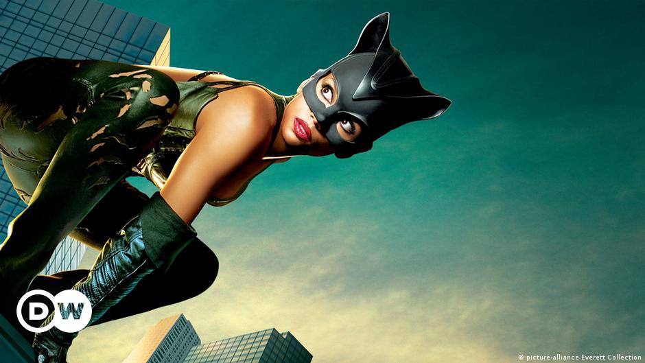 A women's hands holding a plate of old vegetables saved from the trash