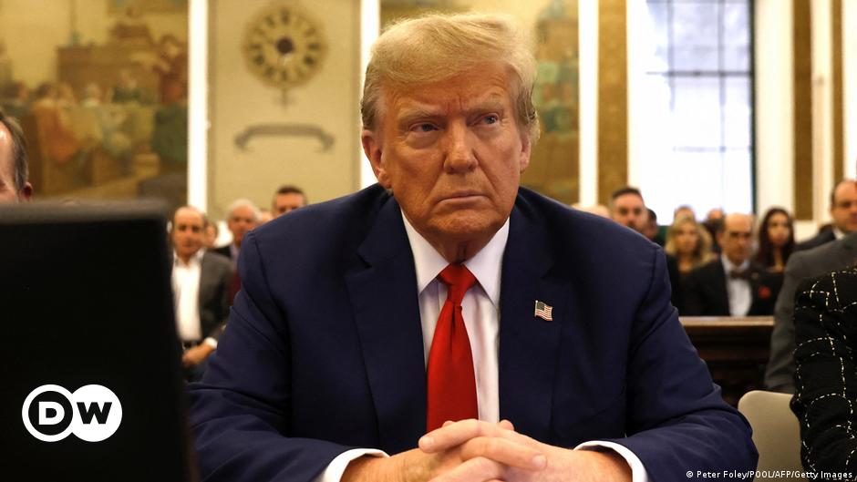 A courtroom drawing showing former US President Donald Trump (right) looking on as his lawyer argues before a three-judge panel at the US Court of Appeals for the District of Columbia on January 9, 2023